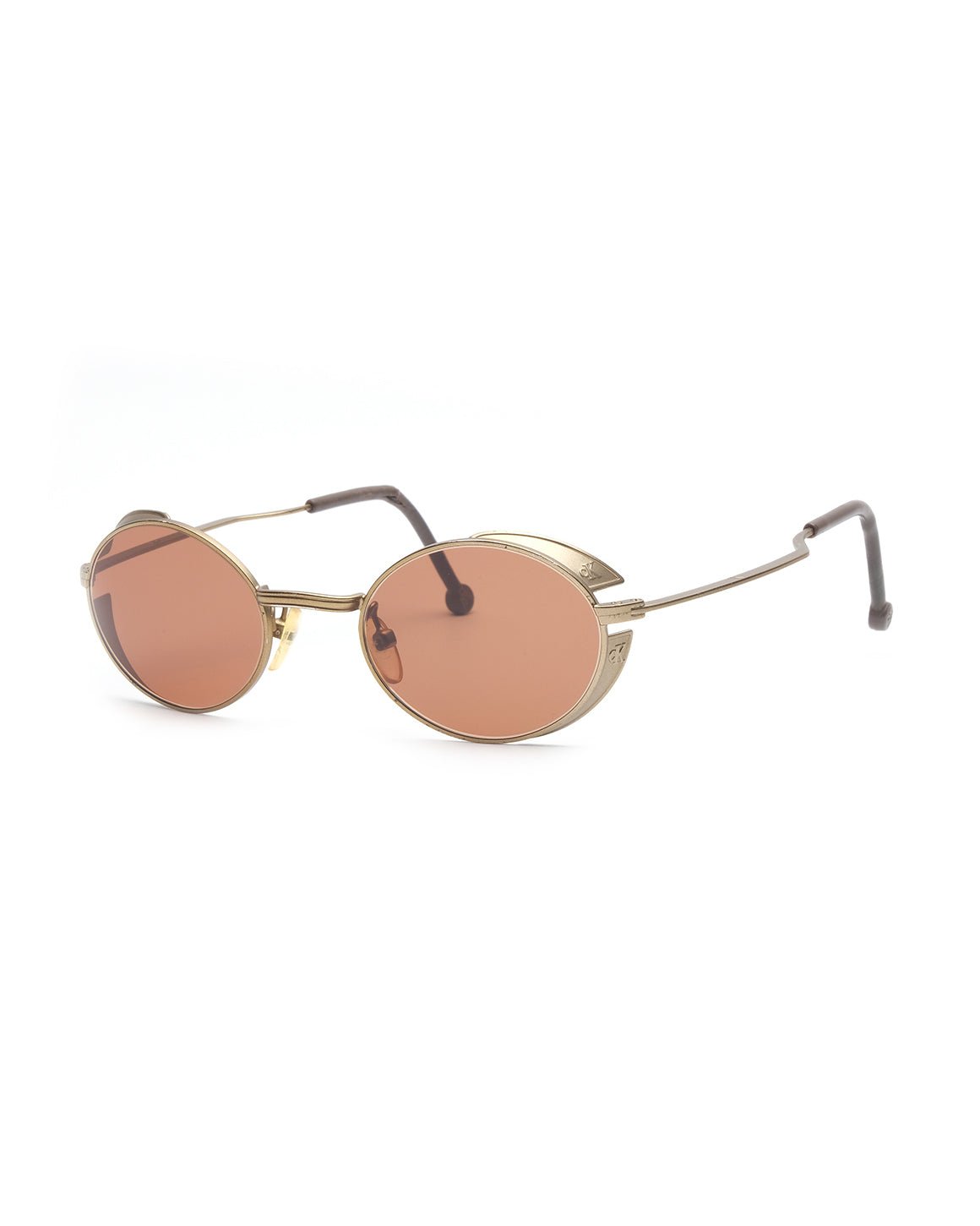 https://cdn.shopify.com/s/files/1/0818/5459/5398/files/1990s-calvin-klein-sunglasses-357827.jpg?v=1742669675
