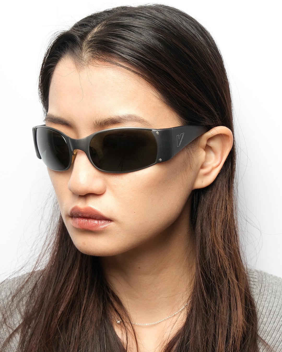 https://cdn.shopify.com/s/files/1/0818/5459/5398/files/1990s-emporio-armani-sunglasses-132668.jpg?v=1749595813