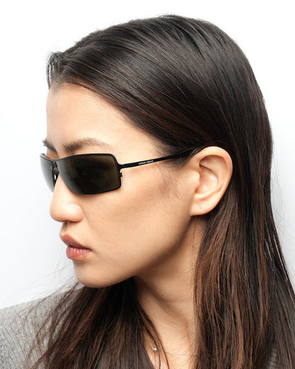 https://cdn.shopify.com/s/files/1/0818/5459/5398/files/1990s-giorgio-armani-sunglasses-444887.jpg?v=1749589627