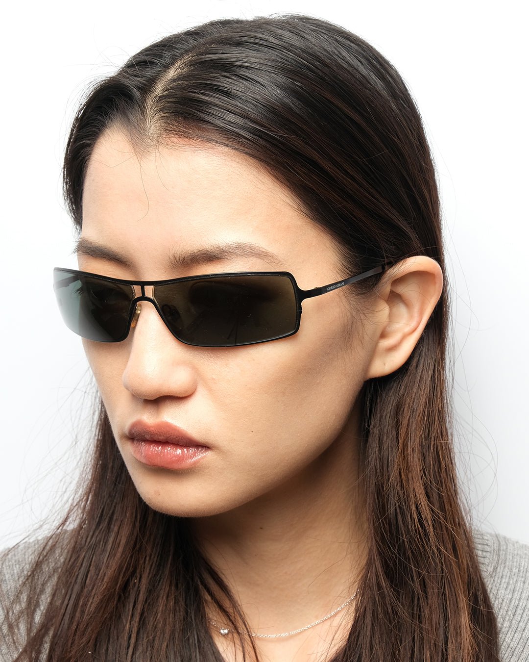 https://cdn.shopify.com/s/files/1/0818/5459/5398/files/1990s-giorgio-armani-sunglasses-643322.jpg?v=1749589627