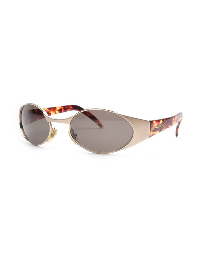 https://cdn.shopify.com/s/files/1/0818/5459/5398/files/1990s-gucci-sunglasses-193988.jpg?v=1739180682