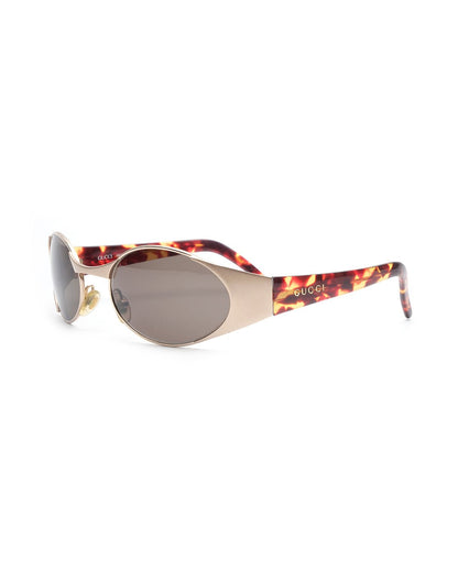 https://cdn.shopify.com/s/files/1/0818/5459/5398/files/1990s-gucci-sunglasses-657487.jpg?v=1739180682