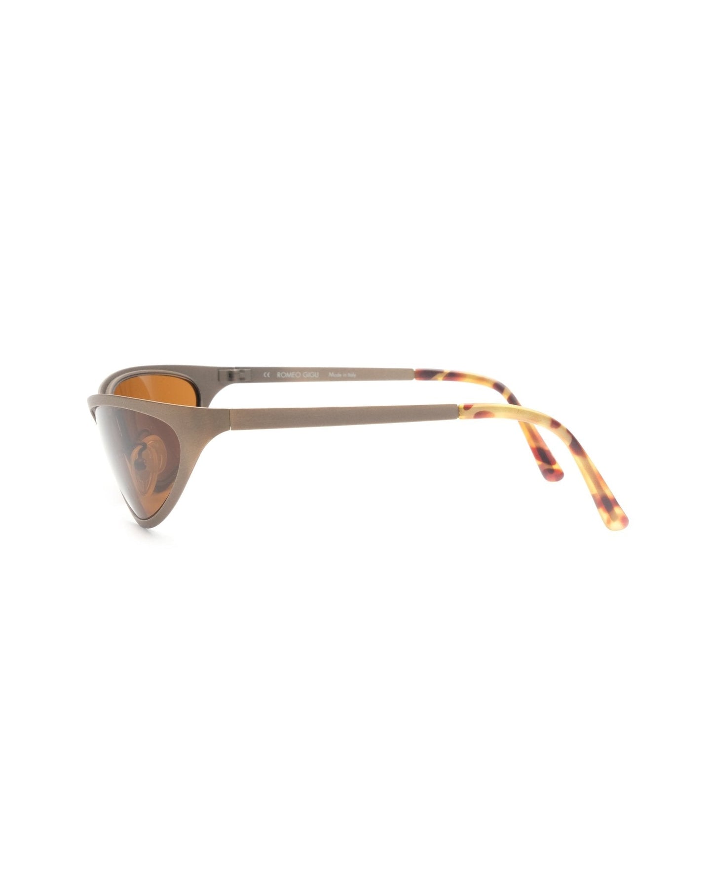 https://cdn.shopify.com/s/files/1/0818/5459/5398/files/1990s-romeo-gigli-sunglasses-su167-317111.jpg?v=1745399958