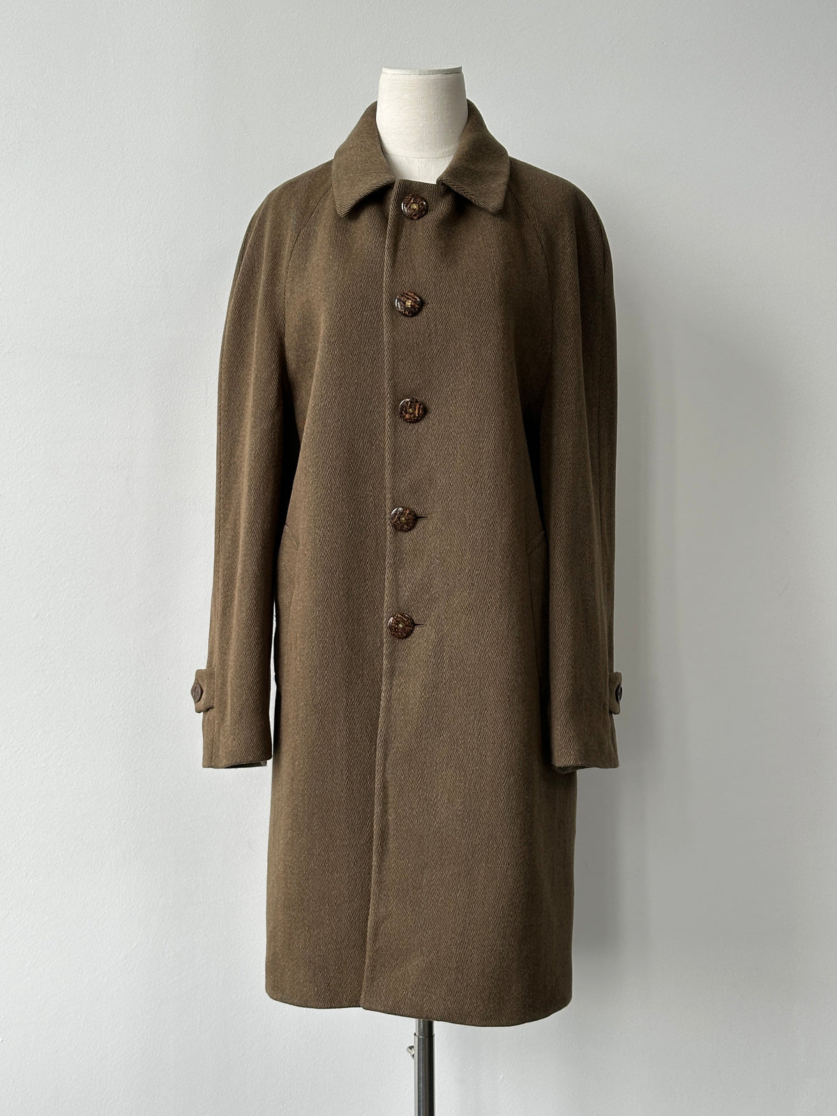Vintage Italian 1990s wool herringbone single-breasted coat, large size, classic tailored design, front view.