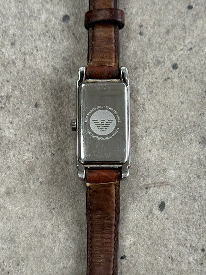 Emporio Armani 2000s leather watch with round dial and black leather strap, showcasing classic design and elegant style.