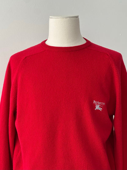 Burberry 1990s pure lambswool logo knit jumper in size M, featuring classic check pattern and ribbed cuffs and hem.