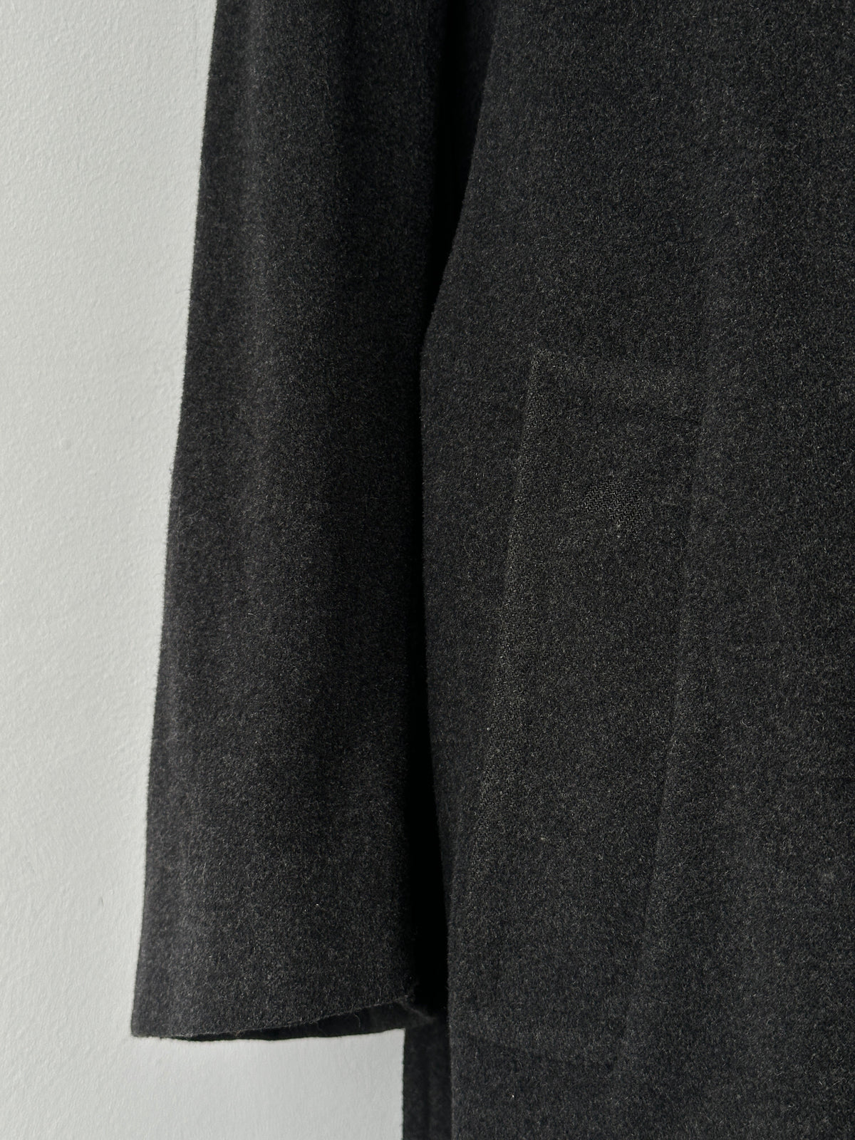 Vintage 1990s wool cashmere high neck belted coat in beige, showcasing classic design and cozy texture in a full front view.