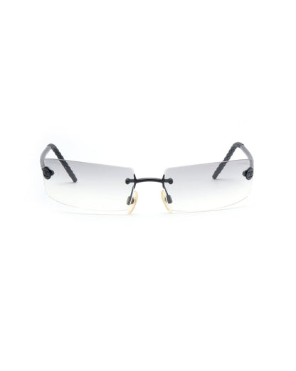 https://cdn.shopify.com/s/files/1/0818/5459/5398/files/2002-chanel-rimless-460587.jpg?v=1743076472