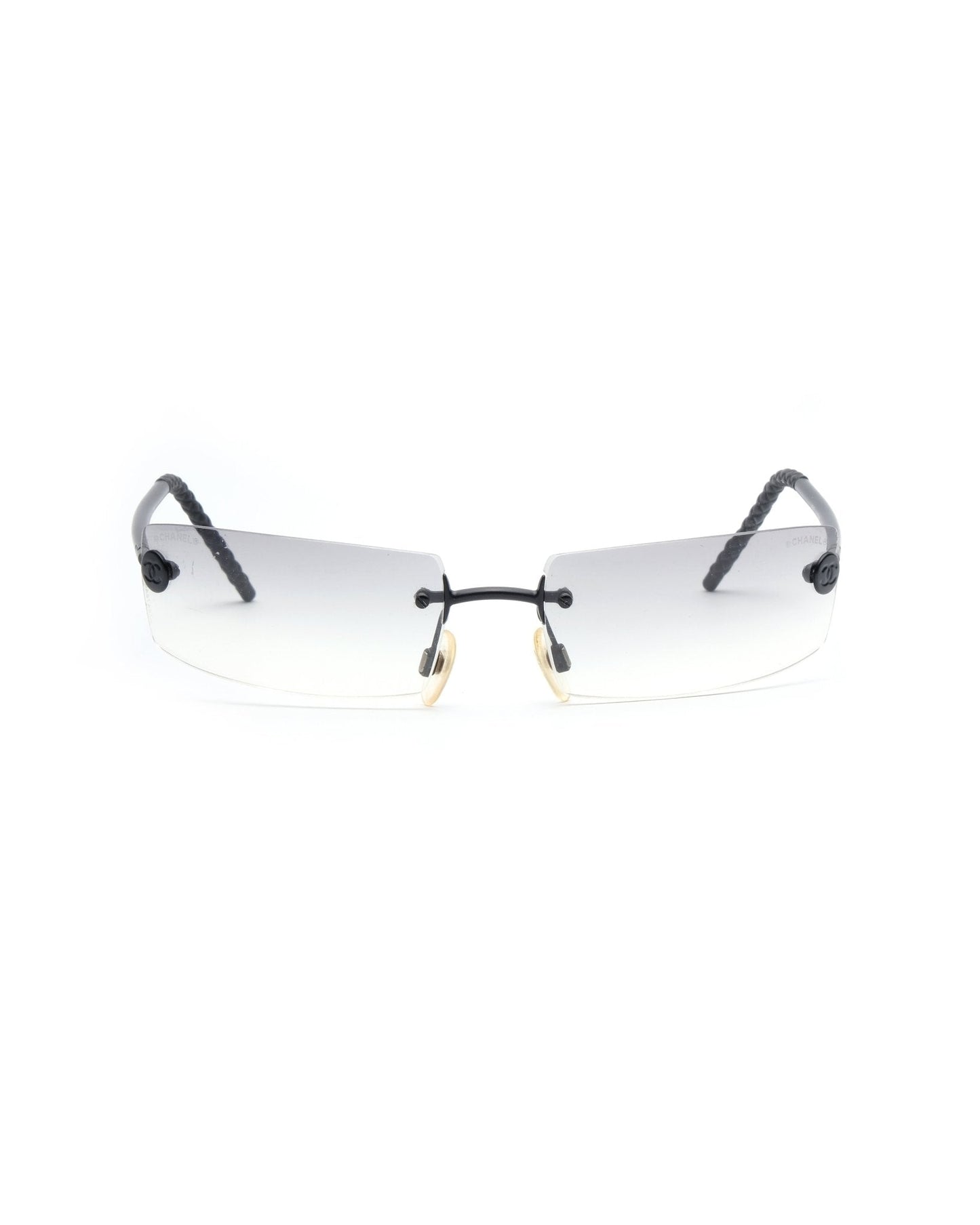 https://cdn.shopify.com/s/files/1/0818/5459/5398/files/2002-chanel-rimless-460587.jpg?v=1743076472