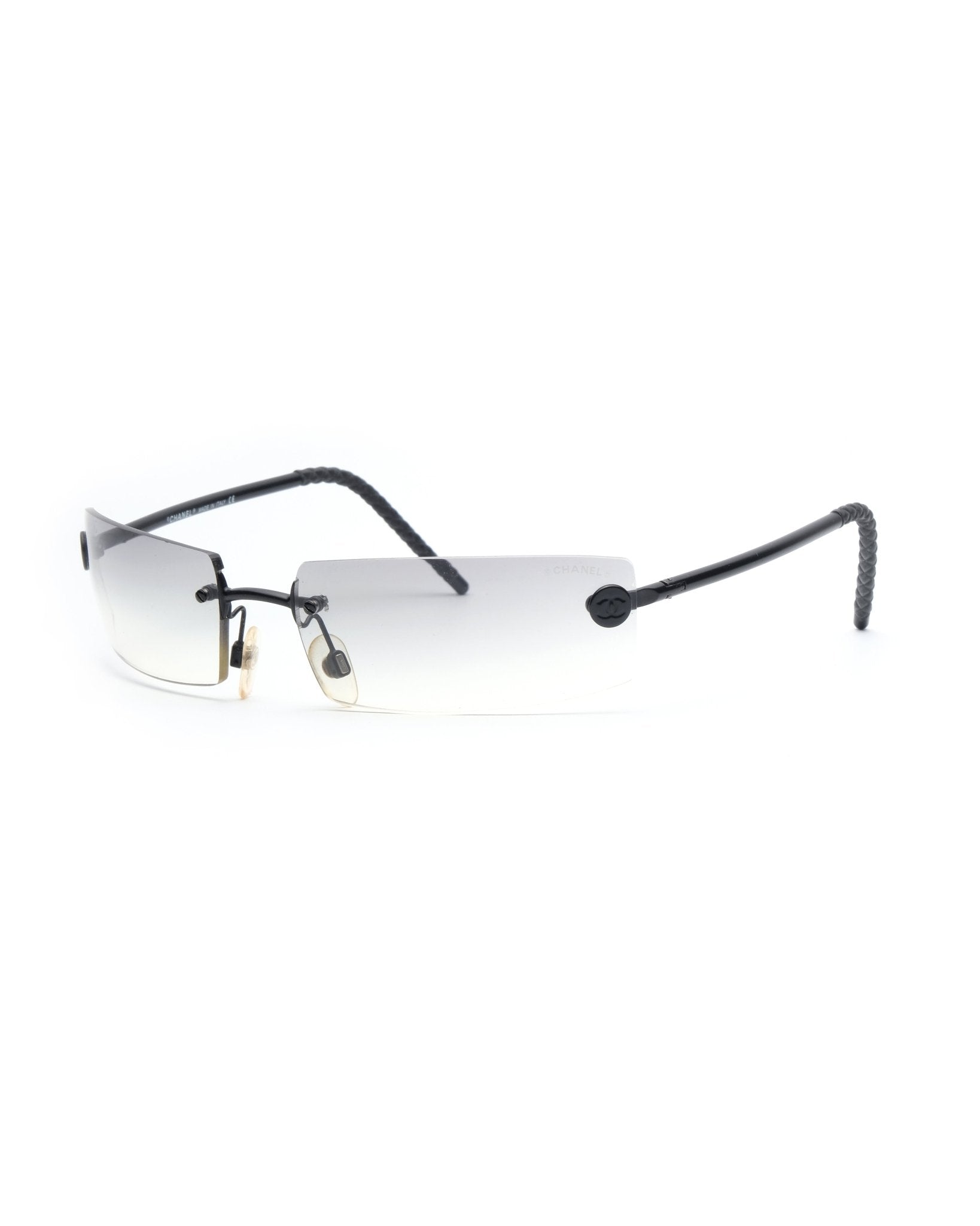 https://cdn.shopify.com/s/files/1/0818/5459/5398/files/2002-chanel-rimless-628681.jpg?v=1743076475