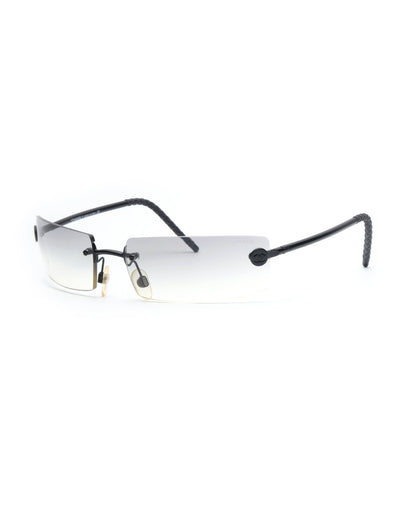 https://cdn.shopify.com/s/files/1/0818/5459/5398/files/2002-chanel-rimless-628681.jpg?v=1743076475