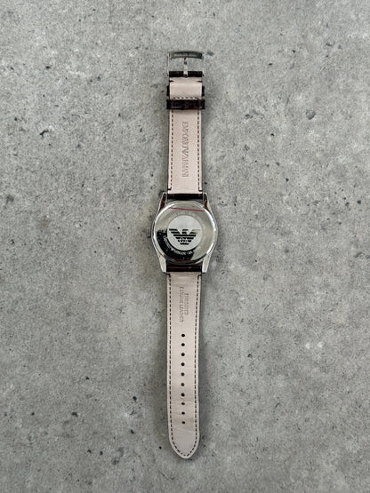 Emporio Armani 2000s leather quartz watch with round dial, sleek design, and leather strap, showcasing elegant craftsmanship.