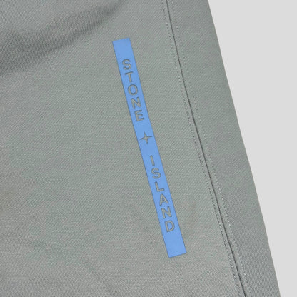 Stone Island AW22 Micrographic Spellout Logo Baby Blue Joggers - XL | XL, Blue