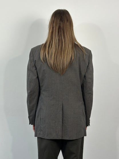 Christian Dior Monsieur 1990s striped single-breasted blazer in size 40R/L, tailored with classic lapels and button closure.