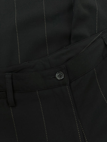 Dolce & Gabbana 2000s wool trousers in size W28, featuring a classic tailored fit and neutral color.