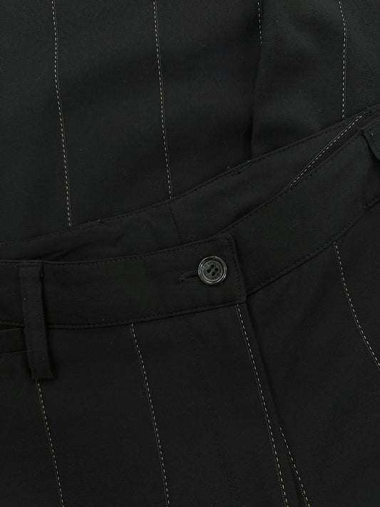 Dolce & Gabbana 2000s wool trousers in size W28, featuring a classic tailored fit and neutral color.