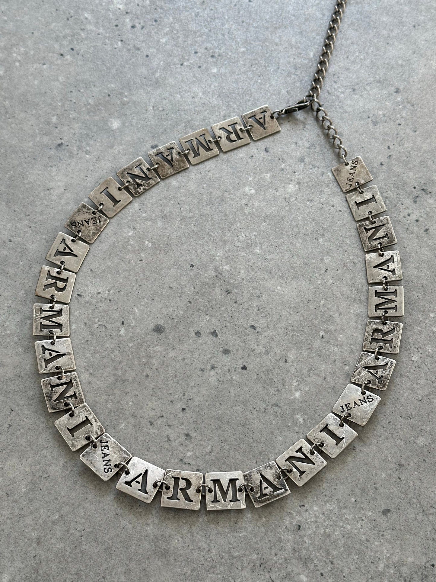 Armani Jeans 1990s monogram chain belt, one size, featuring metallic chain design and branded logo details.