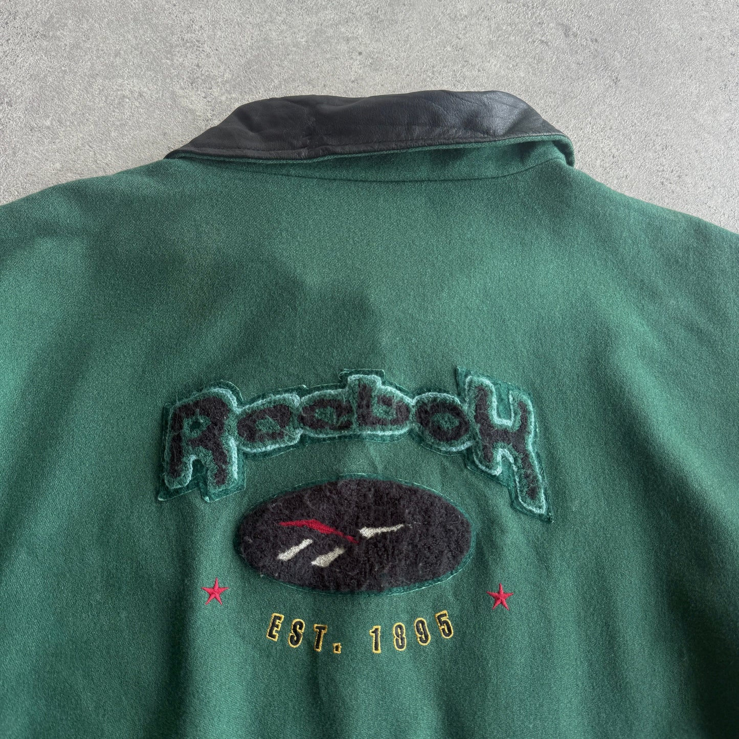 Reebok RARE 1990s heavyweight spellout leather varsity jacket (XL)