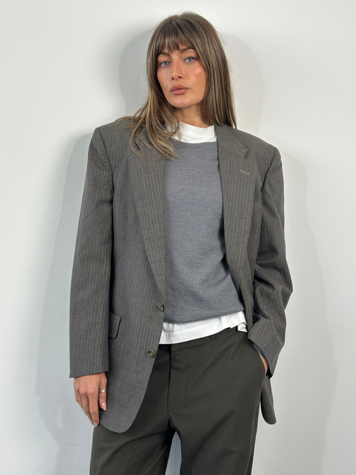 Christian Dior Monsieur 1990s striped single-breasted blazer size 40R/L, featuring classic tailored fit and bold stripe pattern.
