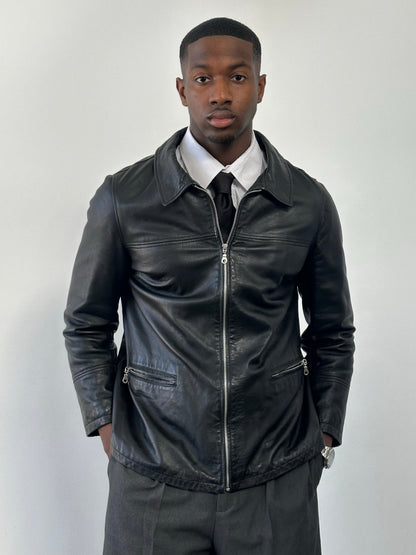 Vintage Italian 1990s leather boxy jacket, size M, featuring classic dark brown leather and structured fit.