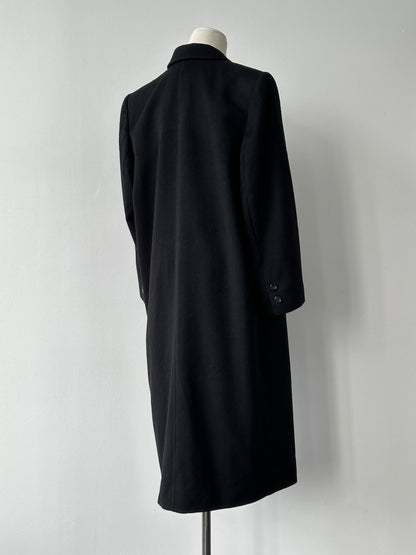 Vintage 1990s pure cashmere double-breasted coat in beige, showcasing tailored collar, buttons, and classic silhouette.