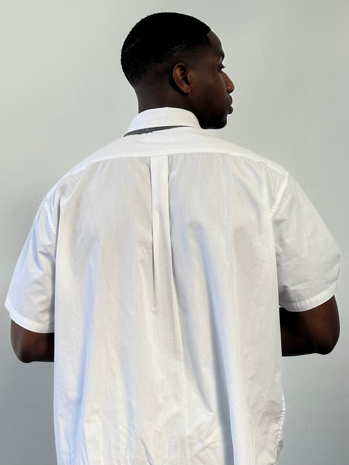 Yves Saint Laurent Pour Homme 1990s cotton short sleeve logo shirt in XXL with classic design and bold branding on the chest