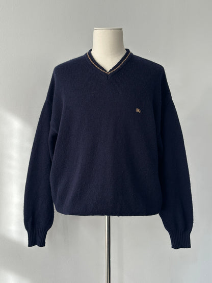 Burberry 1990s pure wool V-neck jumper in XL, cream color, showing the classic design and soft texture of the vintage knit.