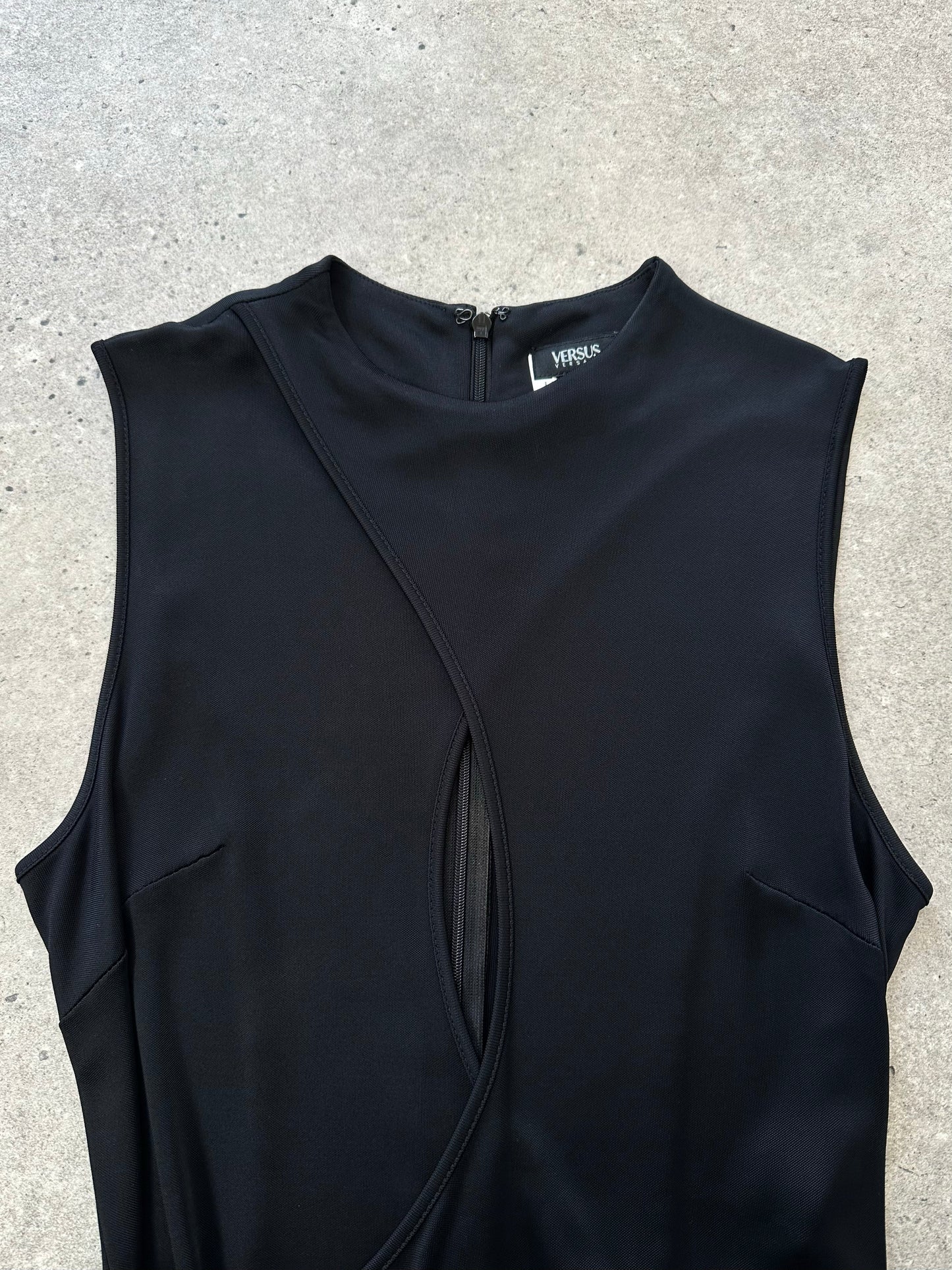 Gianni Versace Versus 1990s sleeveless cut-out floor-length dress, size S/M, with bold design and sleek silhouette.