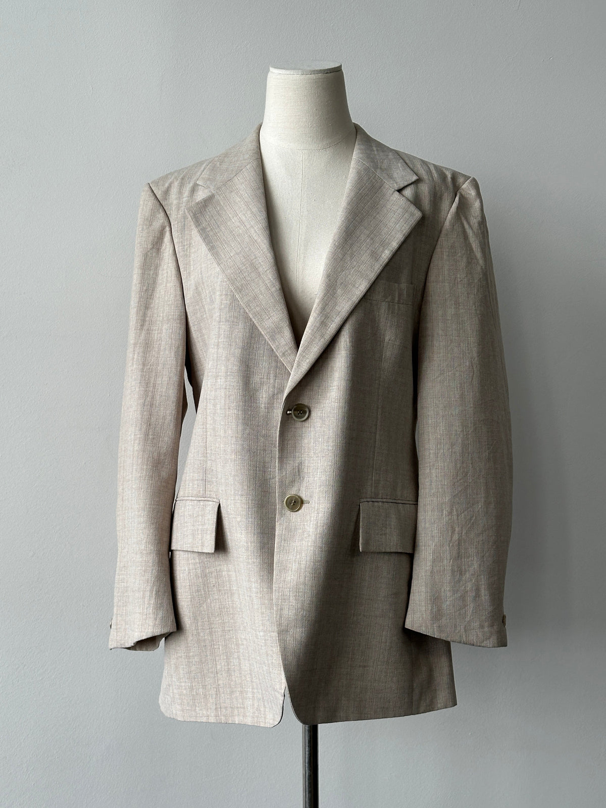 Yves Saint Laurent 1980s wool striped single-breasted blazer, size M, featuring classic tailored fit and vintage design details.