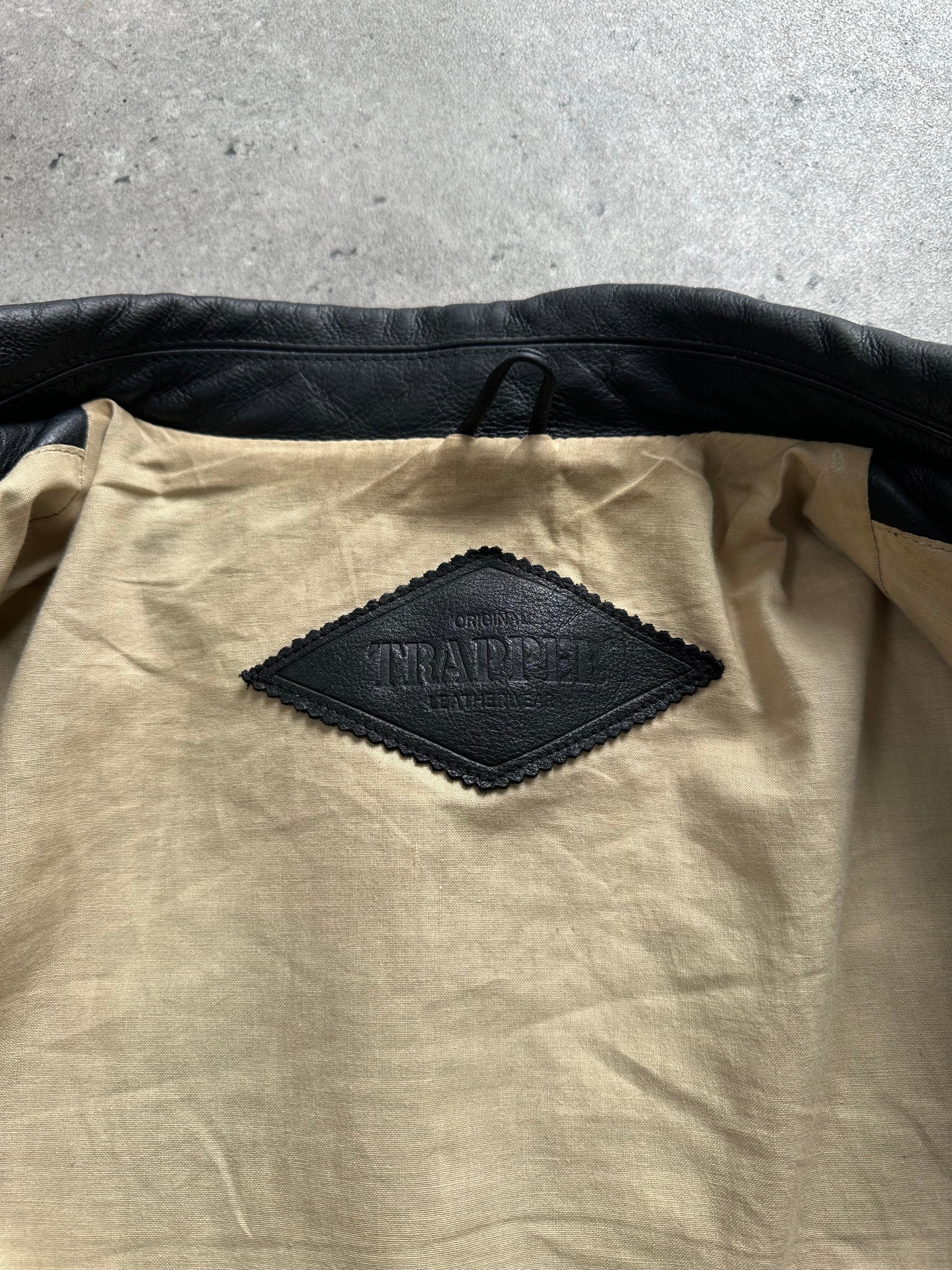 Vintage 1990s heavyweight leather jacket in black, minimal design with XXL size, featuring classic leather texture and stitching.