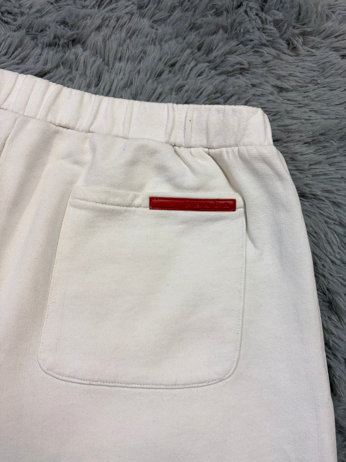 Prada Sport 2010 Red Tab Baggy White Cotton Jogger Shorts - L | O/S, Red