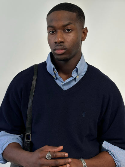 Yves Saint Laurent Pour Homme 1990s wool V-neck jumper in size L, navy blue sweater displayed on a hanger.