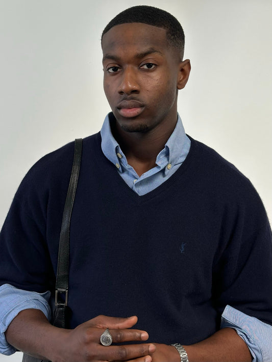Yves Saint Laurent Pour Homme 1990s wool V-neck jumper in size L, navy blue sweater displayed on a hanger.
