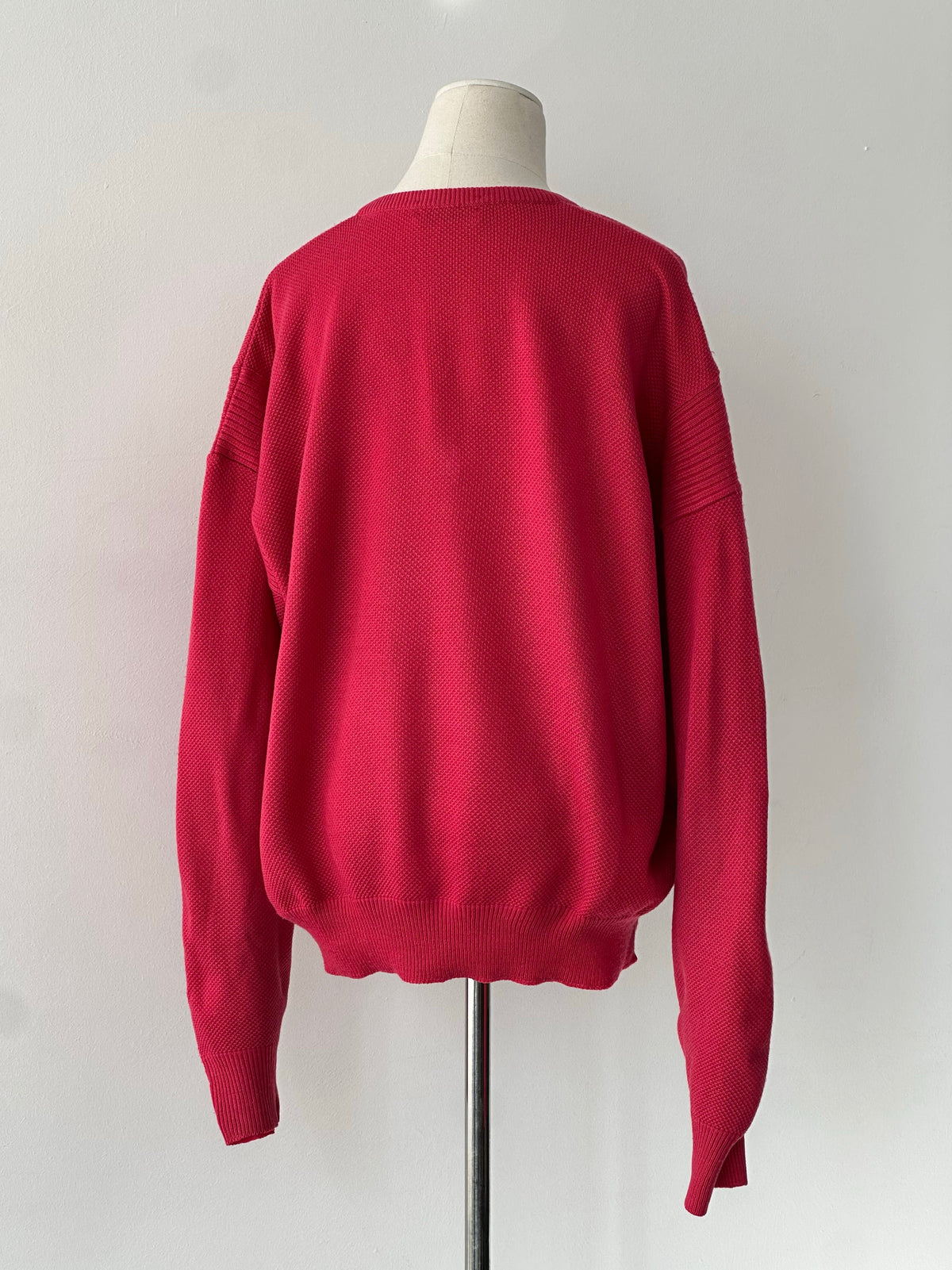 Burberry 1980s V-neck logo knit jumper in size large, featuring the classic Burberry check pattern and logo on the front.