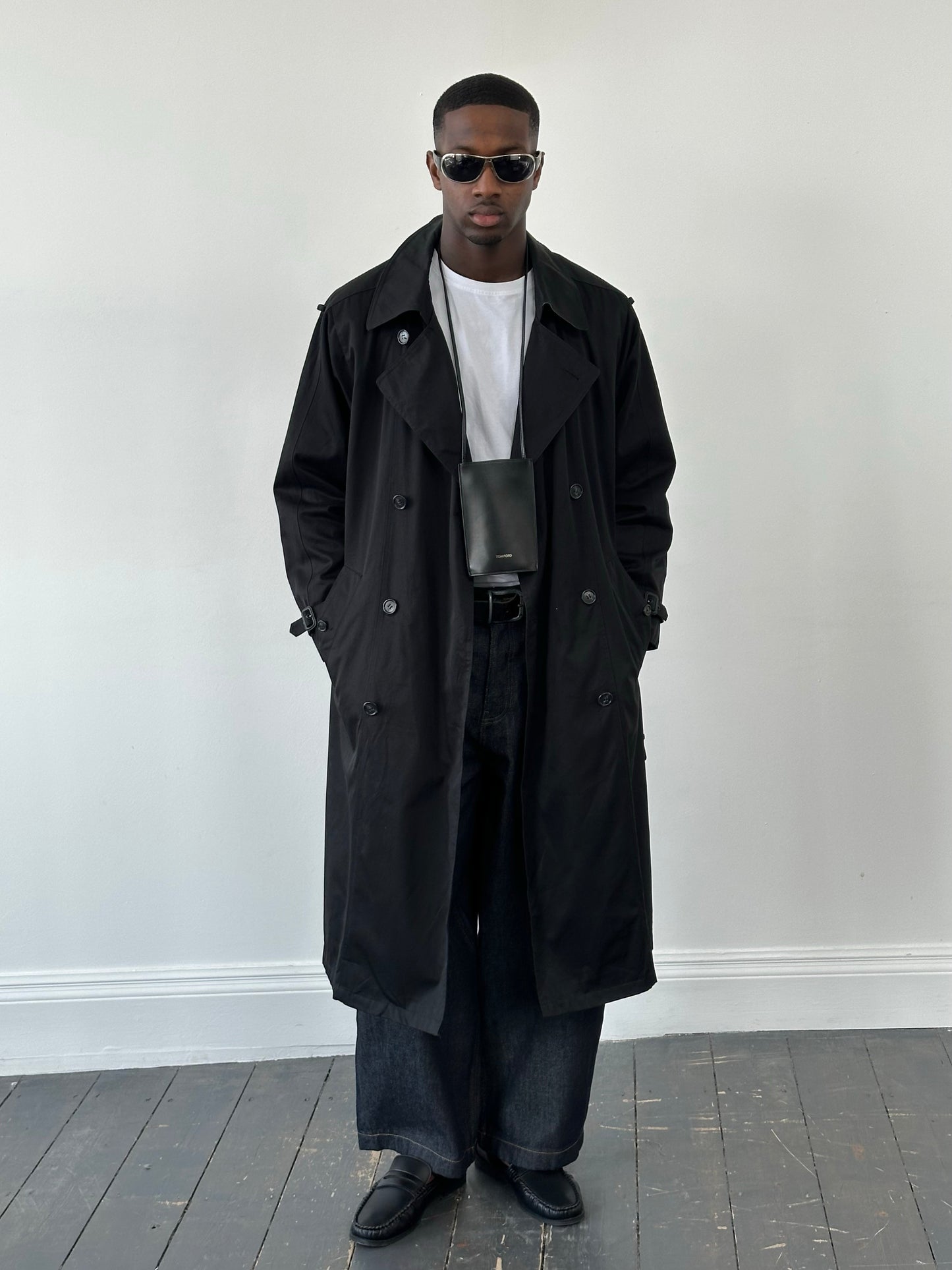 London Fog Towne 1990s double-breasted belted trench coat, classic beige coat with wide lapels and waist belt, front view.