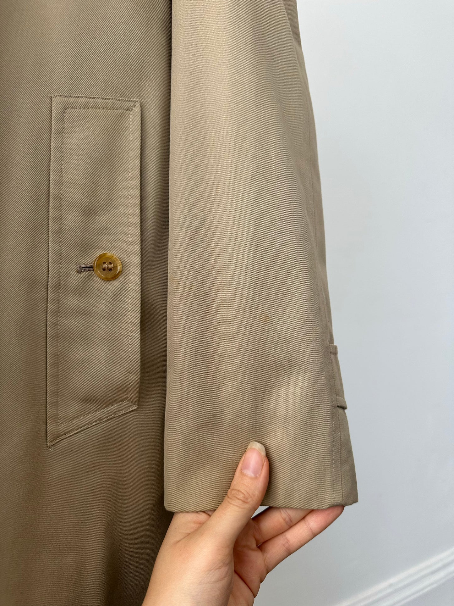 Burberry 1990s pure cotton high neck trench coat in beige, front view showing classic design and high collar detail.