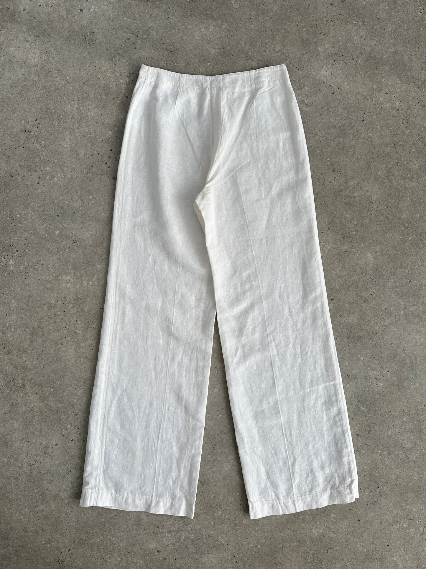 Vintage pure linen low waist wide-leg trousers with relaxed fit and light fabric, featuring a natural vintage style.