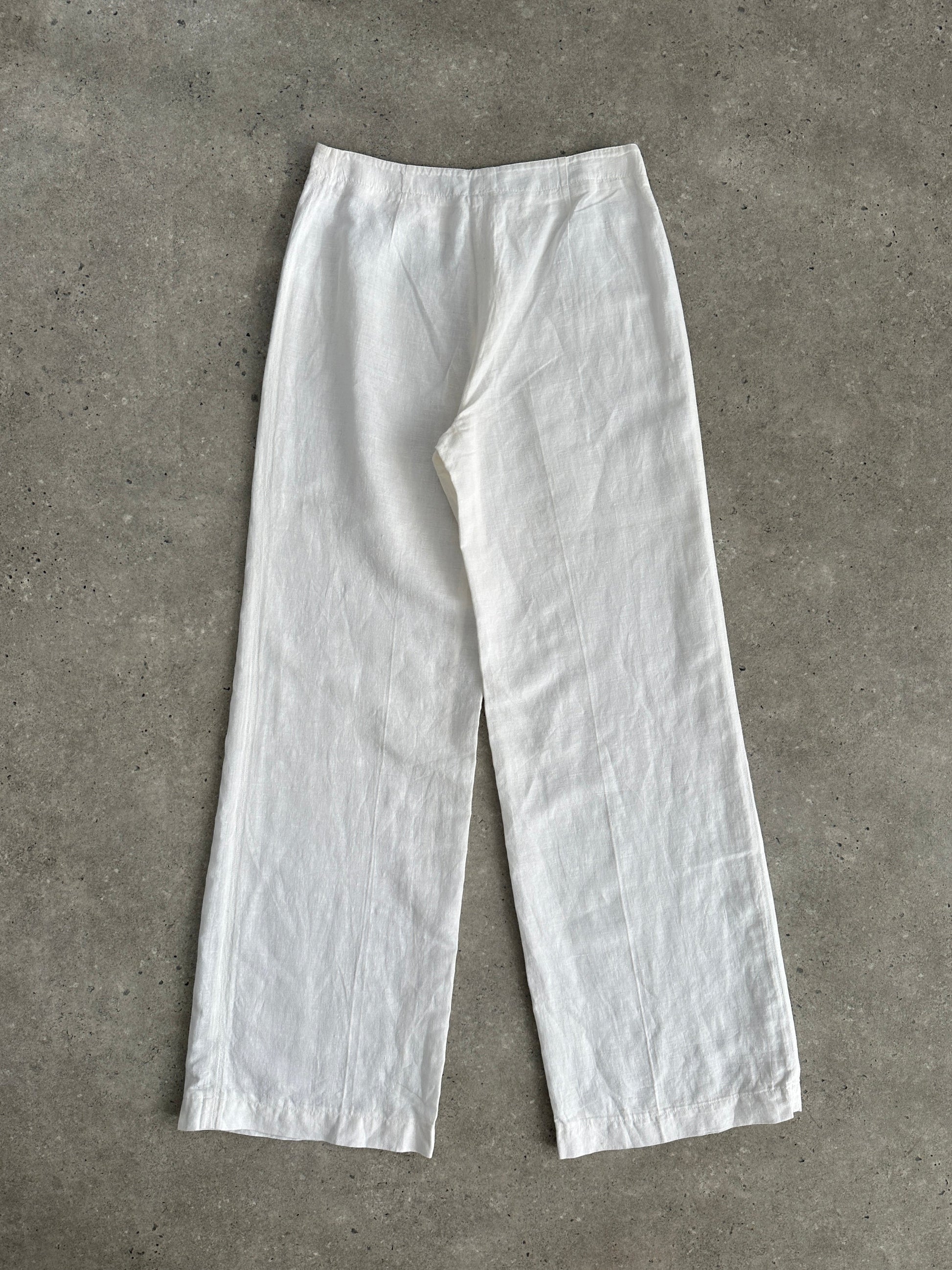 Vintage pure linen low waist wide-leg trousers with relaxed fit and light fabric, featuring a natural vintage style.