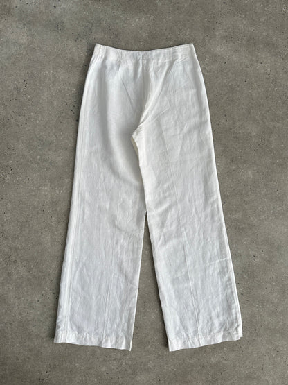 Vintage pure linen low waist wide-leg trousers with relaxed fit and light fabric, featuring a natural vintage style.