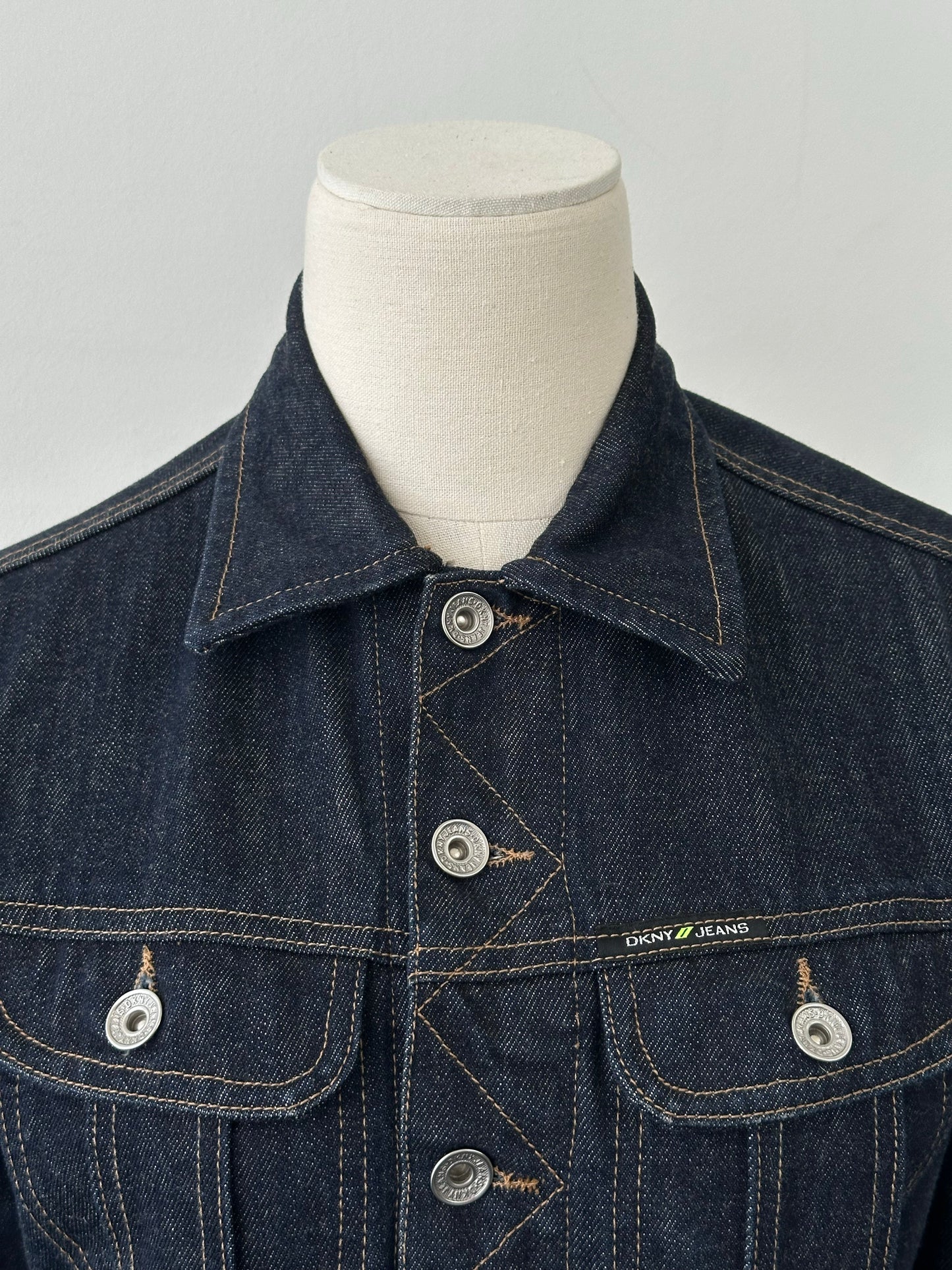 DKNY Jeans 2000s pure cotton fitted denim jacket, size S, showcasing classic blue denim with front pockets and button closure.