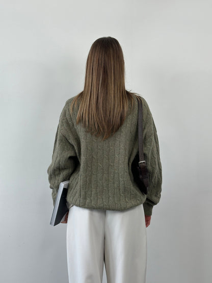 Vintage Italian 1990s wool knitted jumper in XL size, featuring a cozy, textured knit pattern and classic design.
