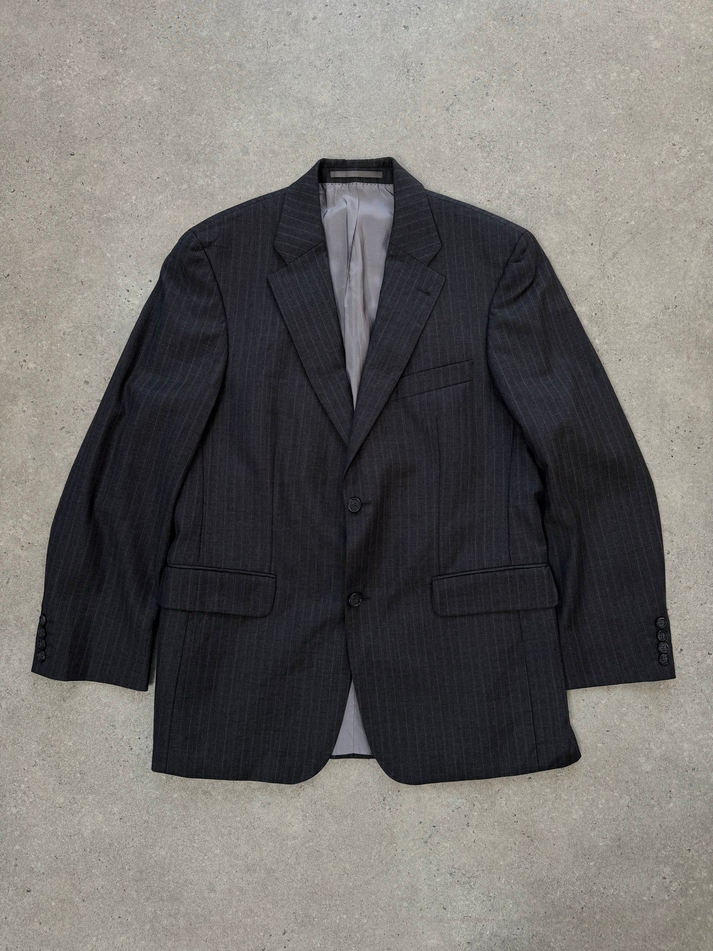 Loro Piana x Digel 1990s pure wool single-breasted blazer in size L, tailored fit, dark navy color, textured fabric.