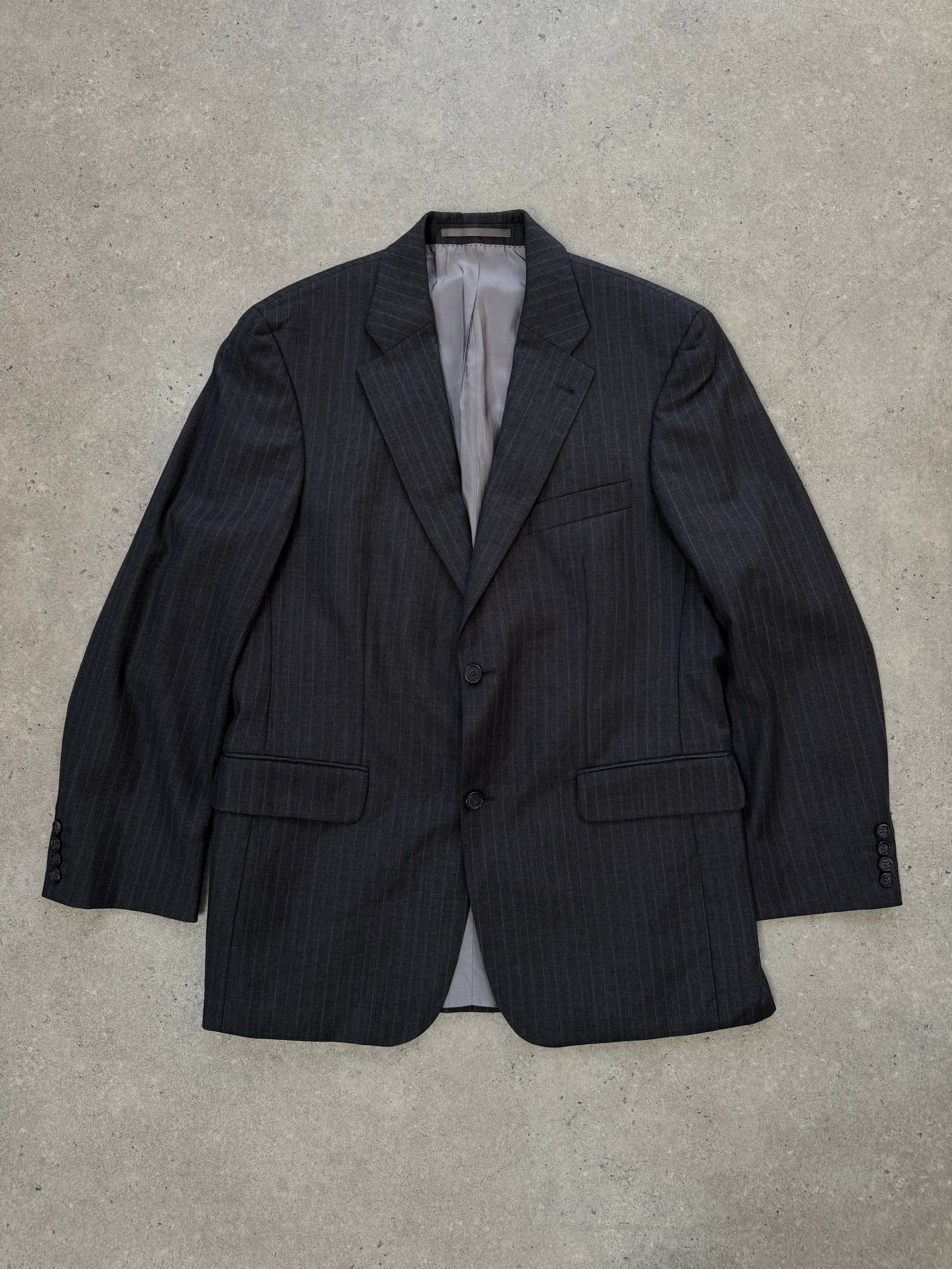 Loro Piana x Digel 1990s pure wool single-breasted blazer in size L, tailored fit, dark navy color, textured fabric.