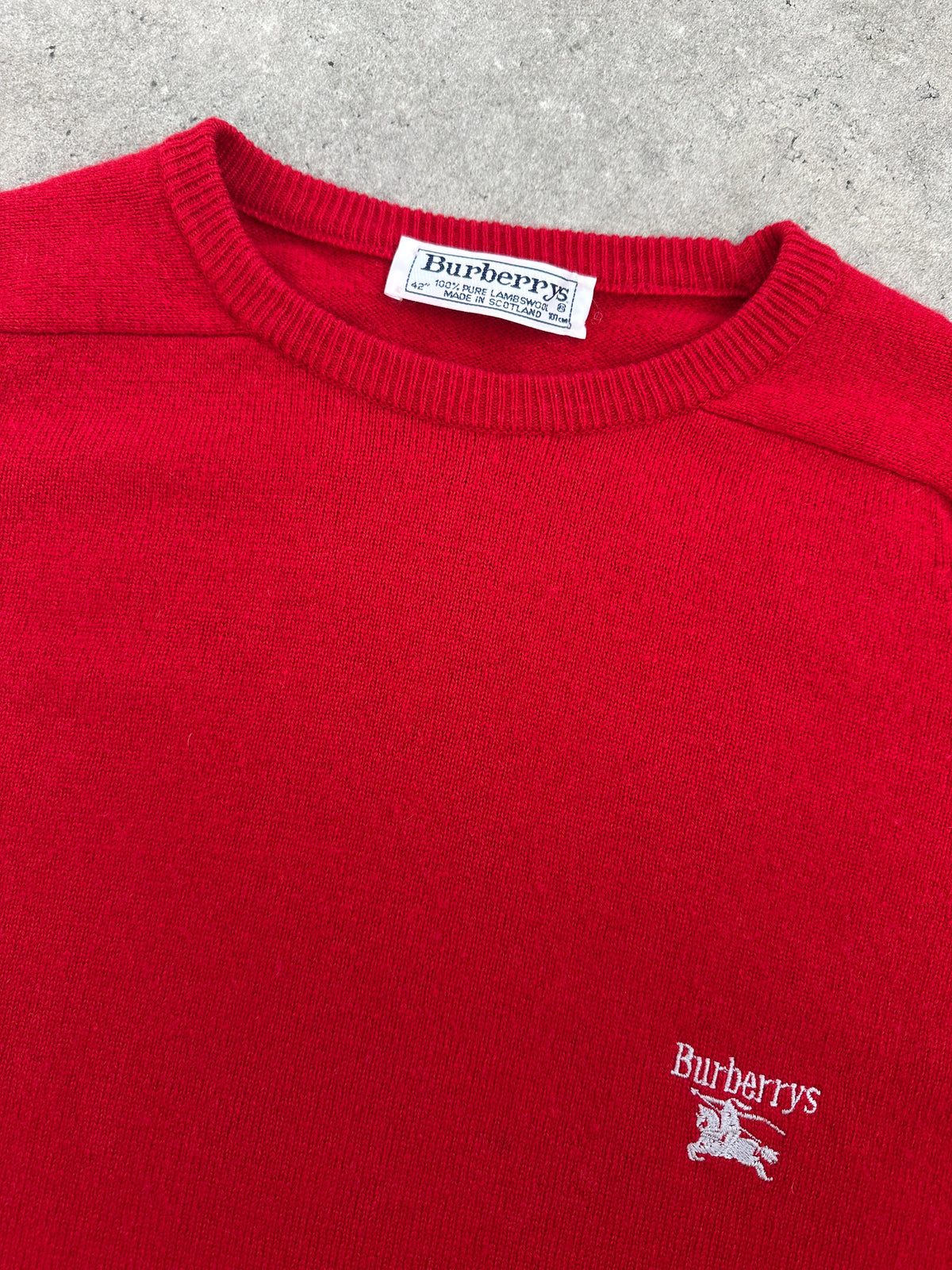 Burberry 1990s pure lambswool logo knit jumper in size M, featuring classic Burberry check pattern and logo embroidery.