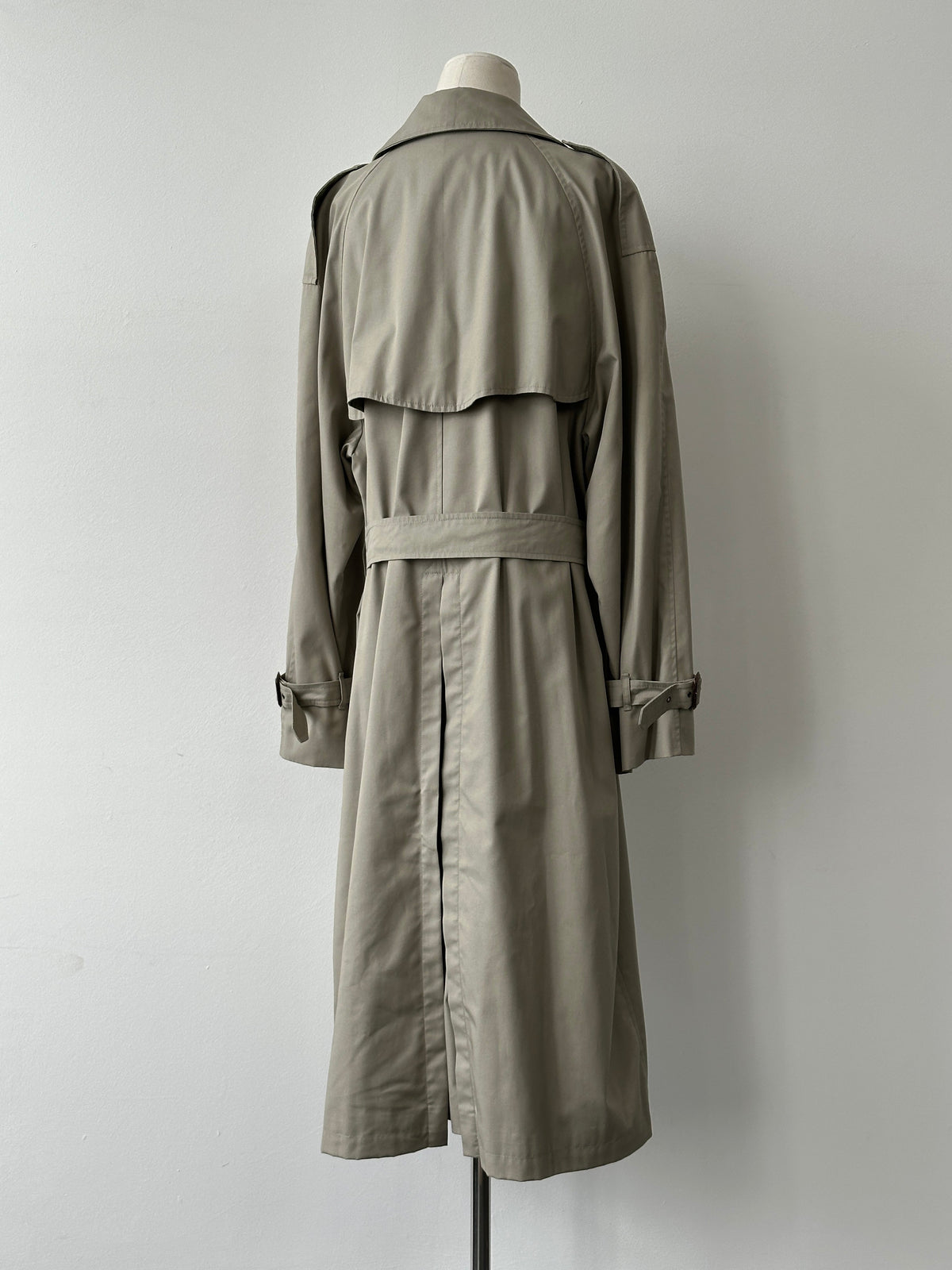 Vintage Italian 1990s high neck belted trench coat, XL size, with classic design and neutral fabric, styled as shown in the image.