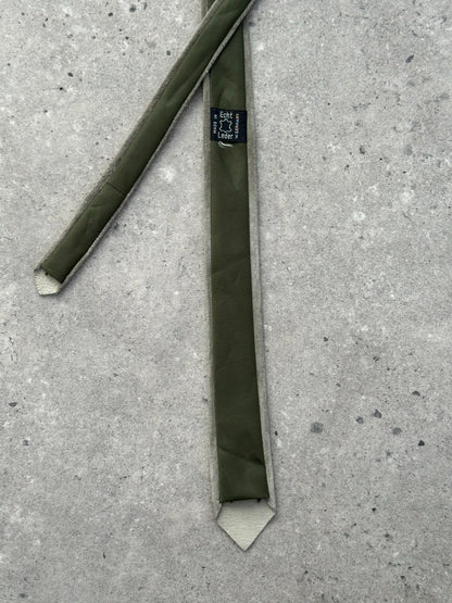 Vintage 1990s suede skinny tie, stylish accessory with textured suede fabric and narrow design, ideal for retro fashion looks.