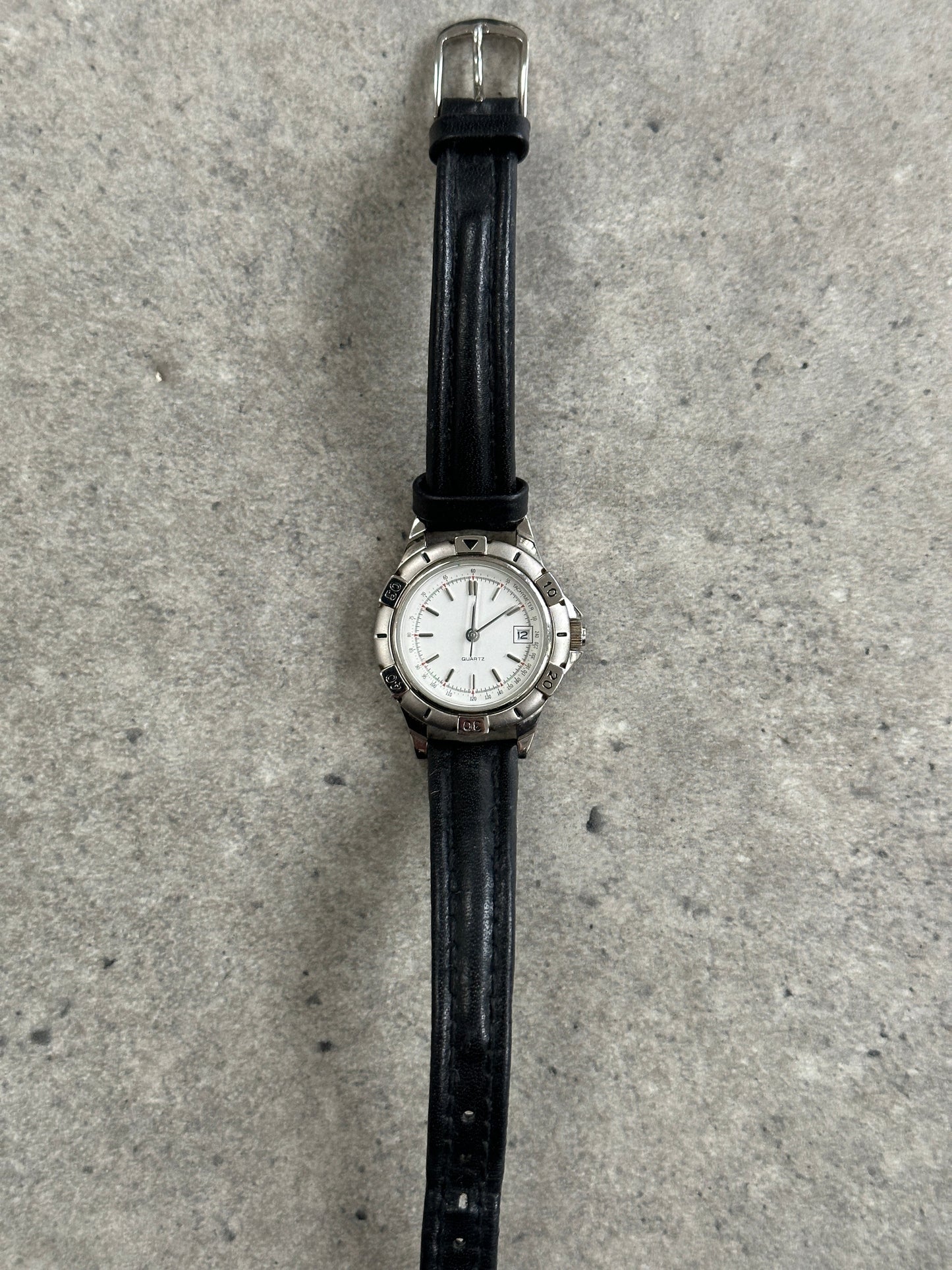 Vintage 1990s Silver Tone Japan Movement Round Quartz Watch