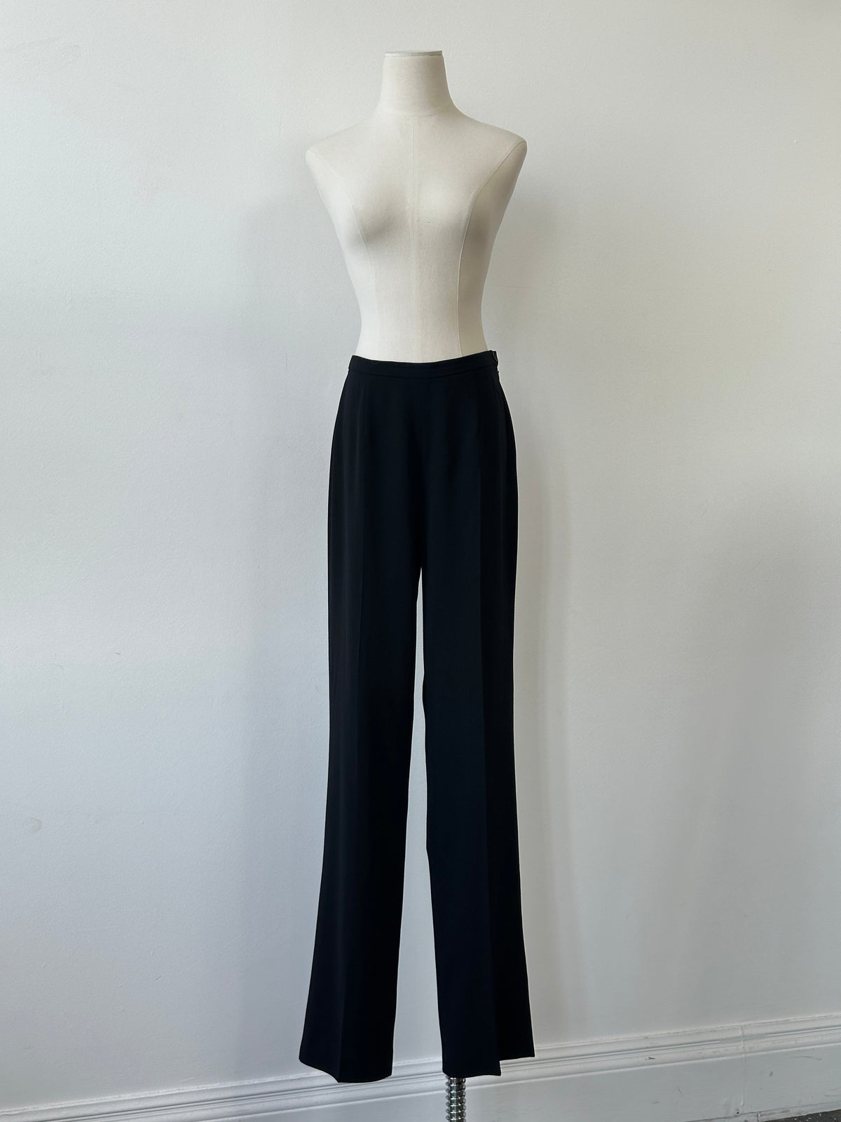 Max Mara 1990s pure wool straight-leg trousers in W28, shown on a model with a classic tailored fit and neutral color.