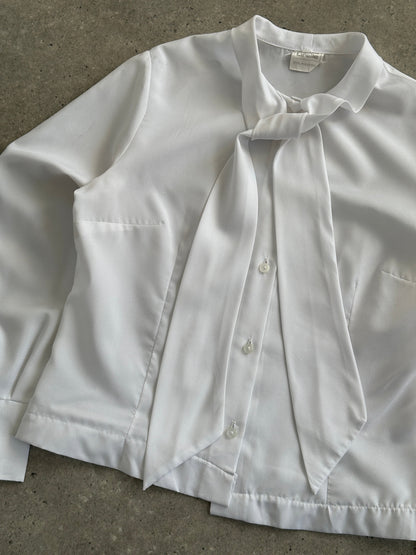 Vintage 1980s men's neck tie shirt in size S/M, featuring retro patterns and classic collar style.