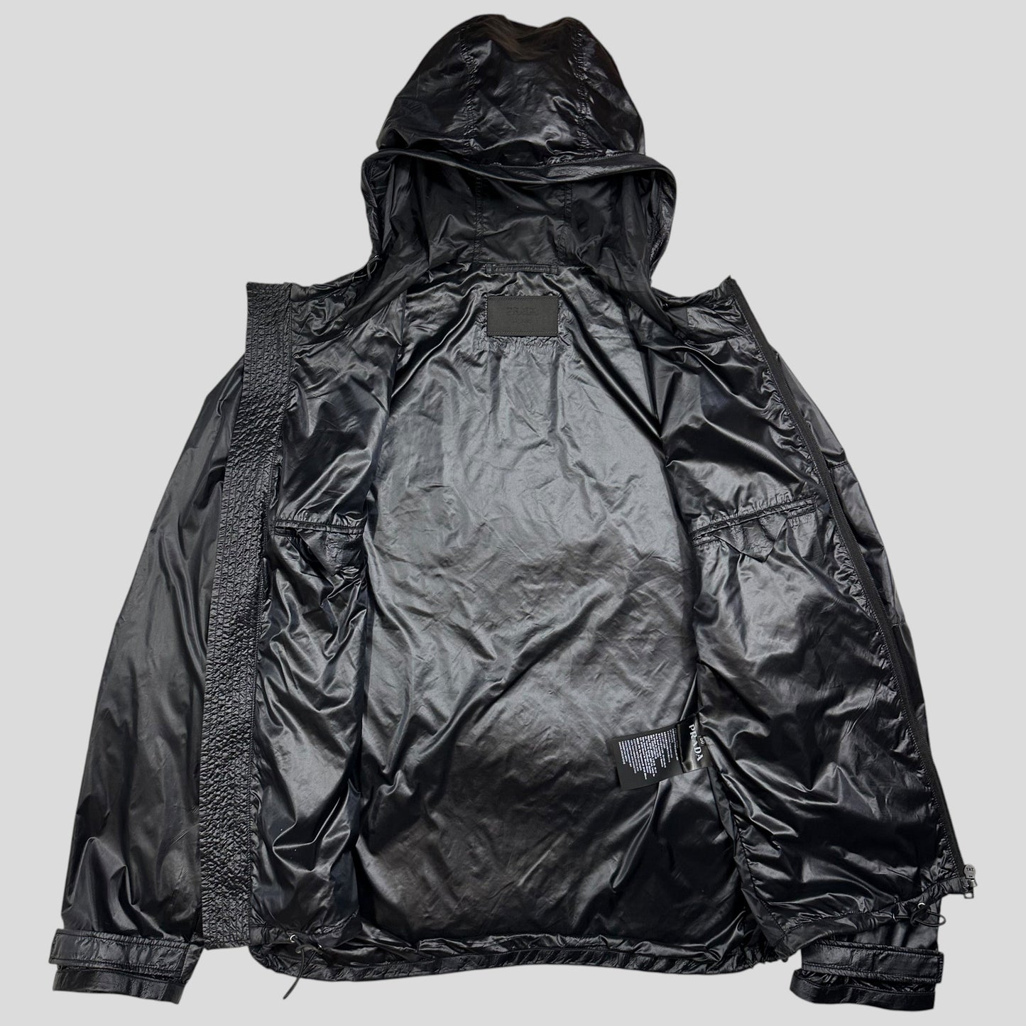 Prada Milano 2017 Rubberised Race Logo Technical Windbreaker - IT50 | Default Title, Black